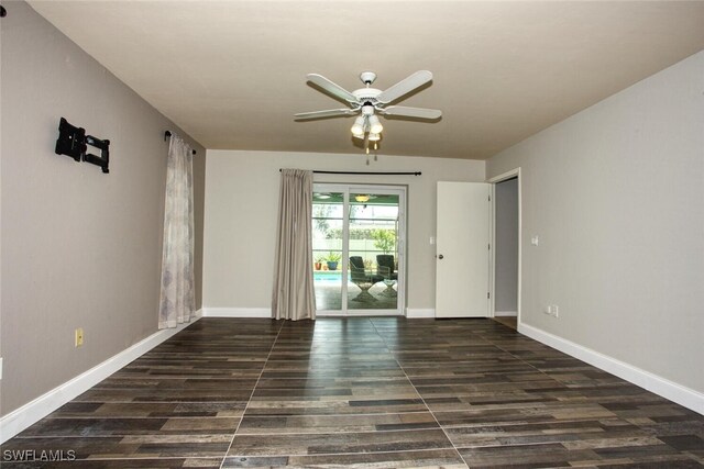 1918 NE 3rd St, Cape Coral, FL 33909 - spare room with a ceiling fan, wood finished floors, and baseboards