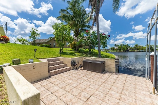 1234 SE 13th Ave, Cape Coral, FL 33990 - view of patio with a water view