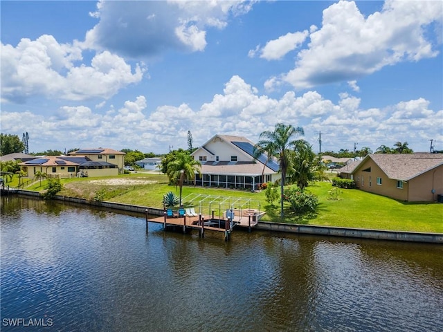 1234 SE 13th Ave, Cape Coral, FL 33990 - dock area featuring a water view, a residential view, and a yard