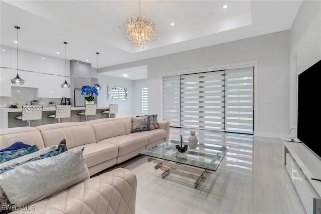 2909 2nd Ave NE, Naples, FL 34120 - living area featuring a chandelier and recessed lighting