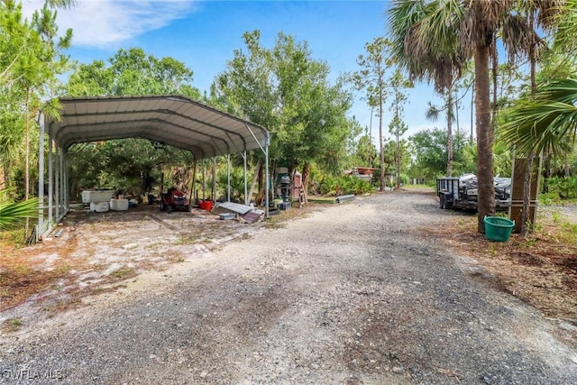 2909 2nd Ave NE, Naples, FL 34120 - view of dirt / gravel driveway