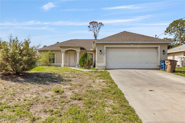 3309 19th St W, Lehigh Acres, FL 33971 - single story home featuring concrete driveway, stucco siding, and an attached garage