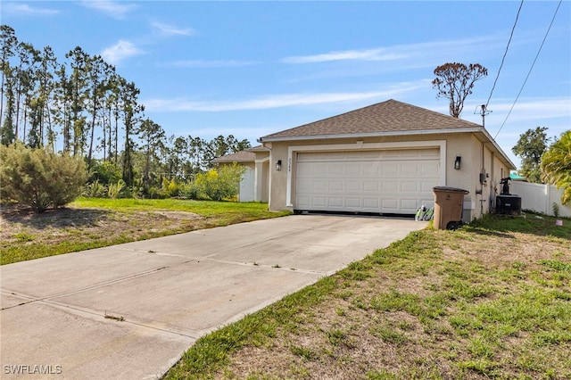 3309 19th St W, Lehigh Acres, FL 33971 - garage featuring driveway