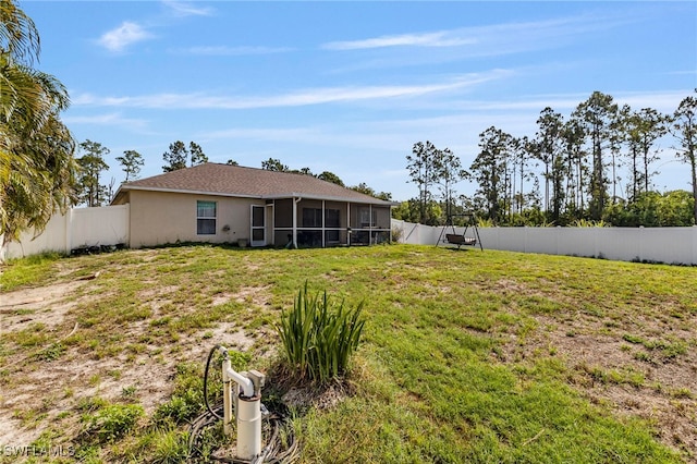 3309 19th St W, Lehigh Acres, FL 33971 - view of yard featuring a sunroom