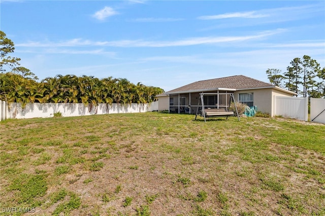 3309 19th St W, Lehigh Acres, FL 33971 - view of yard featuring a sunroom