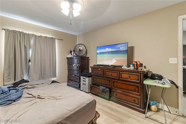 3309 19th St W, Lehigh Acres, FL 33971 - bedroom featuring light wood-style floors and a ceiling fan