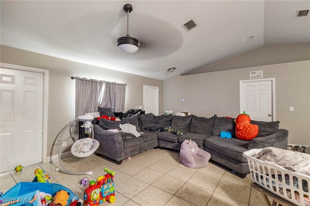 3309 19th St W, Lehigh Acres, FL 33971 - living area featuring light tile patterned floors, vaulted ceiling, and ceiling fan