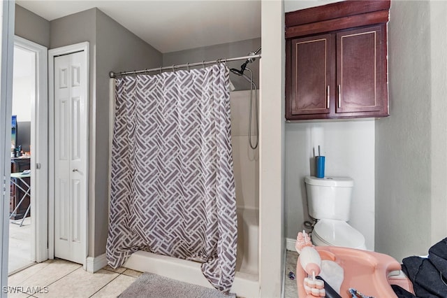 3309 19th St W, Lehigh Acres, FL 33971 - full bath featuring tile patterned flooring, toilet, and shower / bath combination with curtain
