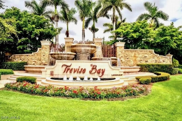 9834 Giaveno Cir Unit 1716, Naples, FL 34113 - community / neighborhood sign with a lawn