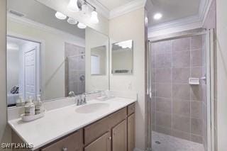 9834 Giaveno Cir Unit 1716, Naples, FL 34113 - full bath with crown molding, vanity, and a shower stall