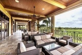9834 Giaveno Cir Unit 1716, Naples, FL 34113 - view of patio / terrace featuring outdoor lounge area and a ceiling fan