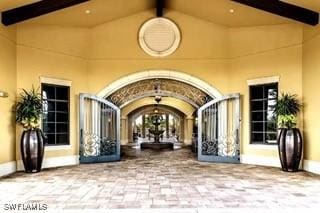 9834 Giaveno Cir Unit 1716, Naples, FL 34113 - view of exterior entry with stucco siding