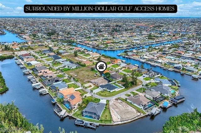 605 SW 39th Ave, Cape Coral, FL 33991 - aerial view of residential area featuring a large body of water