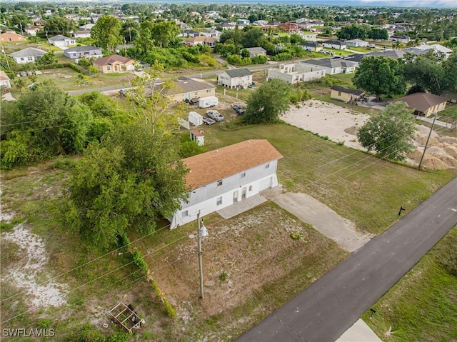 3303 6th St SW, Lehigh Acres, FL 33976 - aerial perspective of suburban area