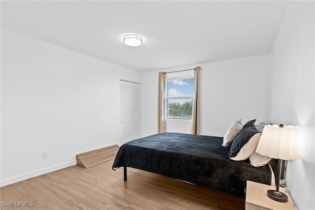 3303 6th St SW, Lehigh Acres, FL 33976 - bedroom featuring wood finished floors and baseboards