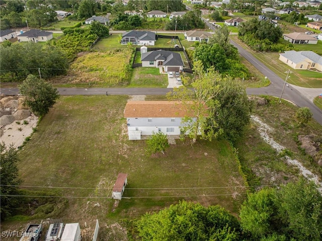 3303 6th St SW, Lehigh Acres, FL 33976 - aerial perspective of suburban area
