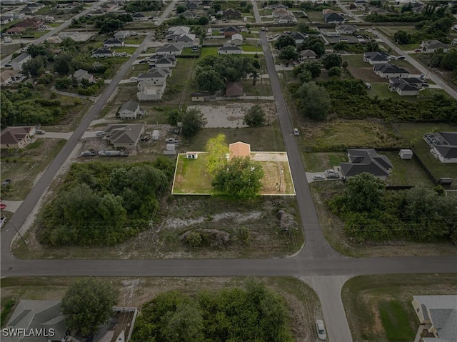 3303 6th St SW, Lehigh Acres, FL 33976 - aerial view of property and surrounding area featuring nearby suburban area