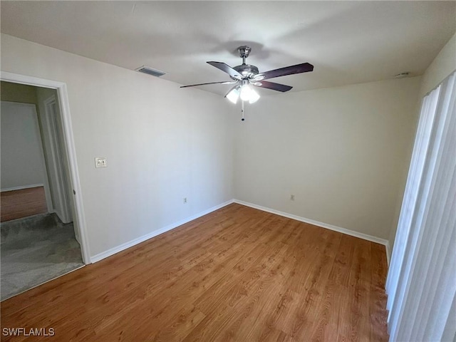1706 Forest Lakes Blvd, Naples, FL 34105 - empty room with ceiling fan, baseboards, and light wood finished floors