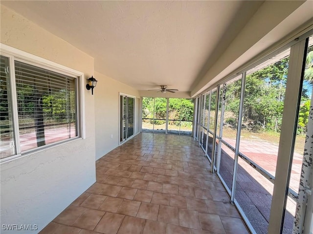 1706 Forest Lakes Blvd, Naples, FL 34105 - unfurnished sunroom featuring a ceiling fan