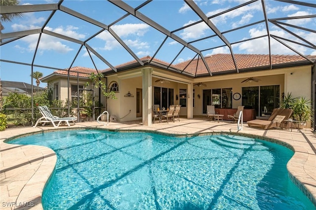 16121 Sand Ridge Ct, Fort Myers, FL 33908 - swimming pool featuring a ceiling fan, a patio, and glass enclosure