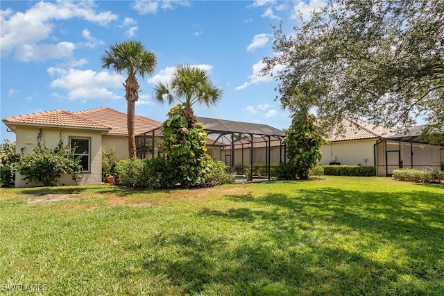16121 Sand Ridge Ct, Fort Myers, FL 33908 - view of green lawn with glass enclosure