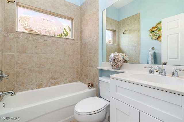 16121 Sand Ridge Ct, Fort Myers, FL 33908 - bathroom with healthy amount of natural light, toilet, vanity, and bathtub / shower combination