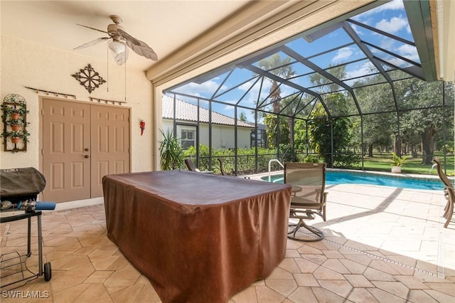 16121 Sand Ridge Ct, Fort Myers, FL 33908 - view of patio featuring a ceiling fan, a hot tub, an outdoor pool, and a lanai