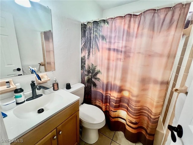 118 Alcala Ave, Lehigh Acres, FL 33936 - bathroom featuring vanity, toilet, tile patterned flooring, and shower / bath combo with shower curtain