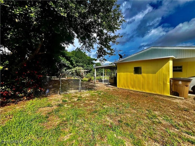 118 Alcala Ave, Lehigh Acres, FL 33936 - view of yard featuring a gate