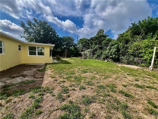 118 Alcala Ave, Lehigh Acres, FL 33936 - view of grassy yard