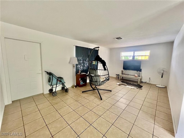 118 Alcala Ave, Lehigh Acres, FL 33936 - exercise room featuring light tile patterned floors