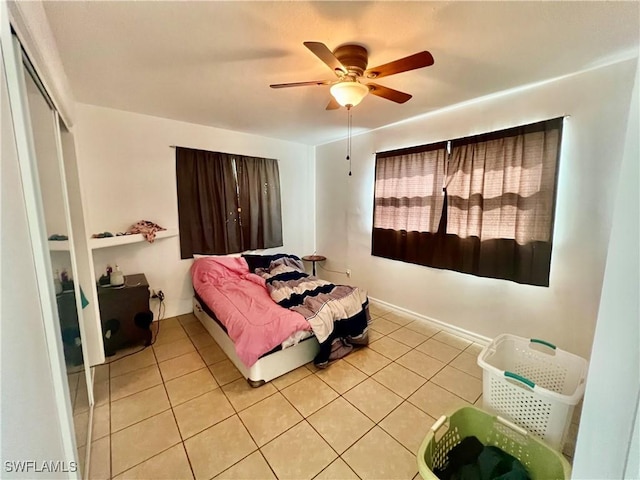 118 Alcala Ave, Lehigh Acres, FL 33936 - bedroom featuring light tile patterned flooring, a closet, and a ceiling fan