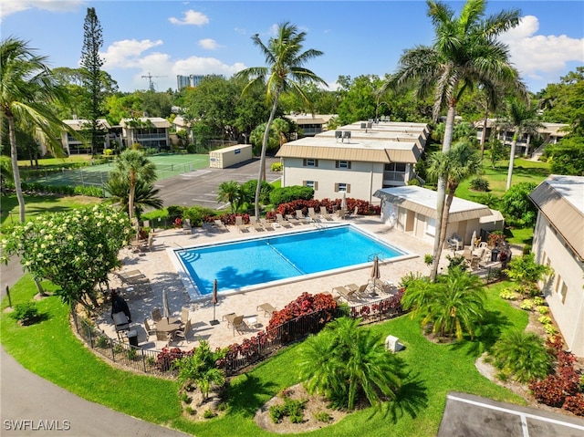 1549 Sandpiper St Unit 39, Naples, FL 34102 - community pool with a patio
