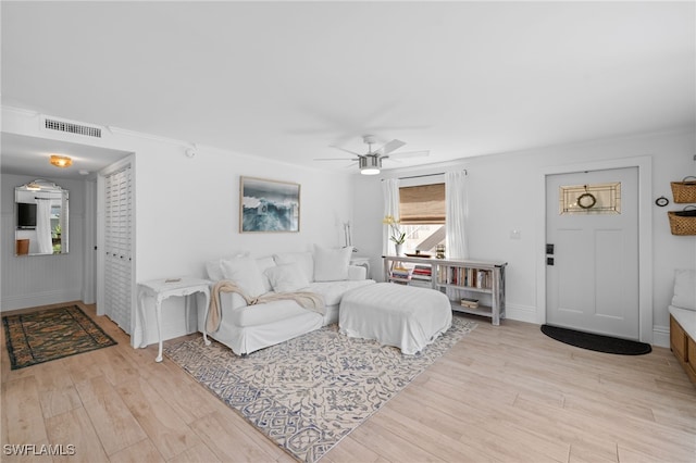 1549 Sandpiper St Unit 39, Naples, FL 34102 - living area featuring light wood-type flooring, ceiling fan, and baseboards