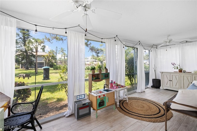 1549 Sandpiper St Unit 39, Naples, FL 34102 - sunroom / solarium with wood finished floors
