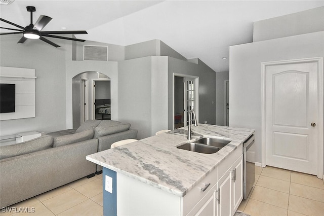 3408 26th St SW, Lehigh Acres, FL 33976 - kitchen with a sink, dishwasher, a ceiling fan, open floor plan, and vaulted ceiling