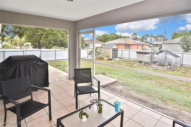 3408 26th St SW, Lehigh Acres, FL 33976 - view of patio / terrace featuring a residential view and a grill
