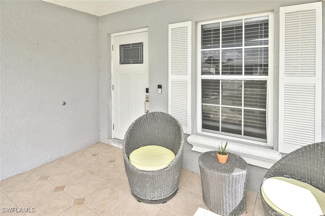 3408 26th St SW, Lehigh Acres, FL 33976 - view of exterior entry with stucco siding