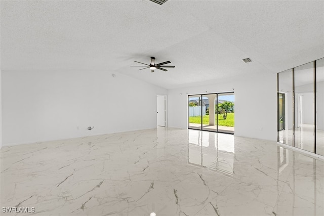 1306 SW 10th Pl, Cape Coral, FL 33991 - unfurnished room featuring marble tiled flooring, ceiling fan, a textured ceiling, and vaulted ceiling