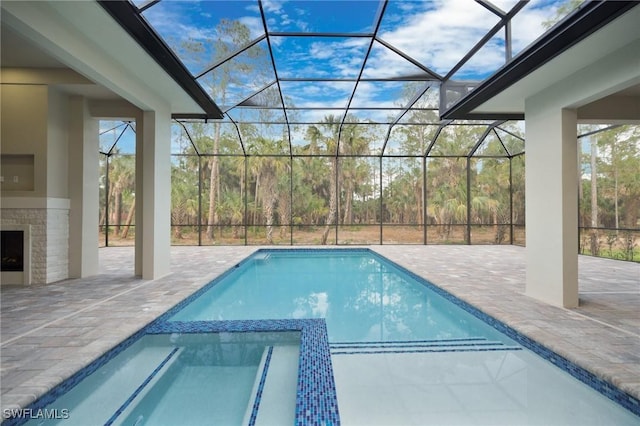 524 13th St SW, Naples, FL 34117 - view of pool with a patio area, a pool with connected hot tub, and a lanai