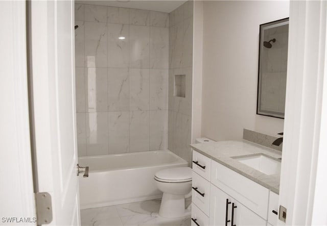 1013 Agnes Ave, Lehigh Acres, FL 33971 - full bath featuring vanity, marble look tile flooring, toilet, and  shower combination