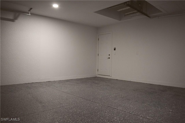 1013 Agnes Ave, Lehigh Acres, FL 33971 - garage featuring recessed lighting and baseboards