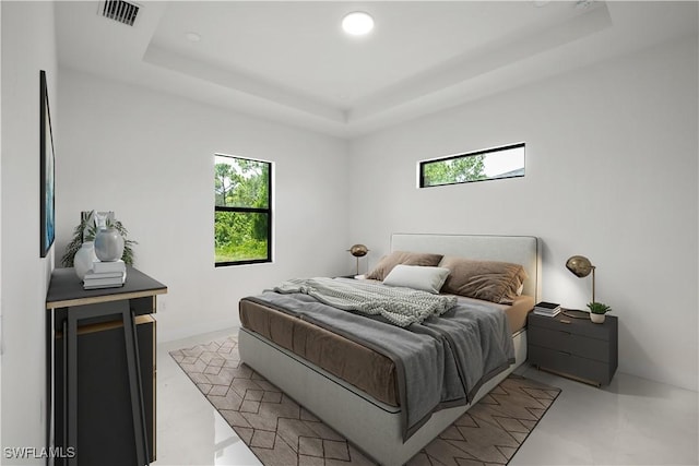 2811 27th St SW, Lehigh Acres, FL 33976 - bedroom featuring a tray ceiling and recessed lighting