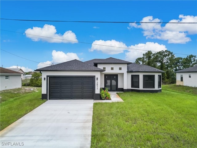 2811 27th St SW, Lehigh Acres, FL 33976 - view of front facade with stucco siding, driveway, a garage, a front yard, and a shingled roof