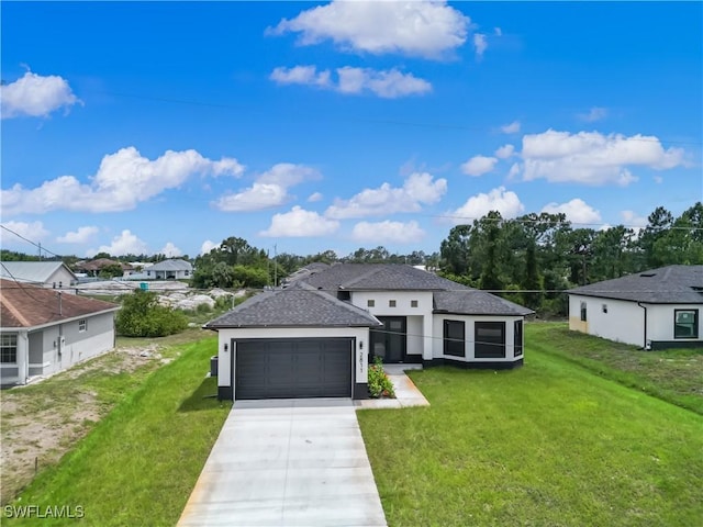 2811 27th St SW, Lehigh Acres, FL 33976 - view of front of home with driveway, a front lawn, a garage, stucco siding, and a shingled roof