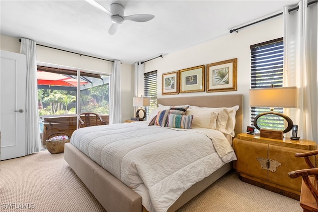 5631 Shaddelee Ln W, Fort Myers, FL 33919 - bedroom with access to outside and light colored carpet