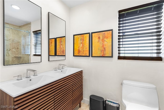 5631 Shaddelee Ln W, Fort Myers, FL 33919 - full bathroom with double vanity and toilet
