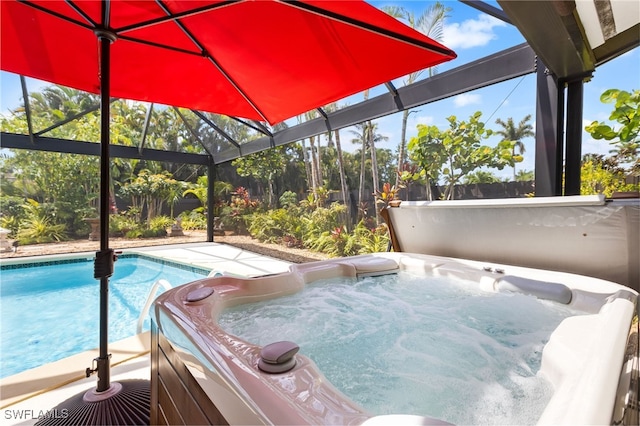 5631 Shaddelee Ln W, Fort Myers, FL 33919 - swimming pool featuring a hot tub and glass enclosure