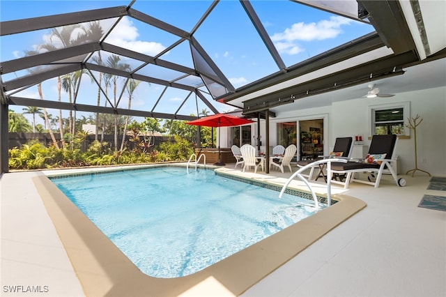 5631 Shaddelee Ln W, Fort Myers, FL 33919 - outdoor pool featuring a patio area, ceiling fan, and glass enclosure