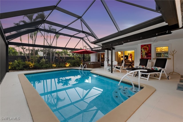 5631 Shaddelee Ln W, Fort Myers, FL 33919 - outdoor pool featuring a hot tub, a patio area, a lanai, and a ceiling fan
